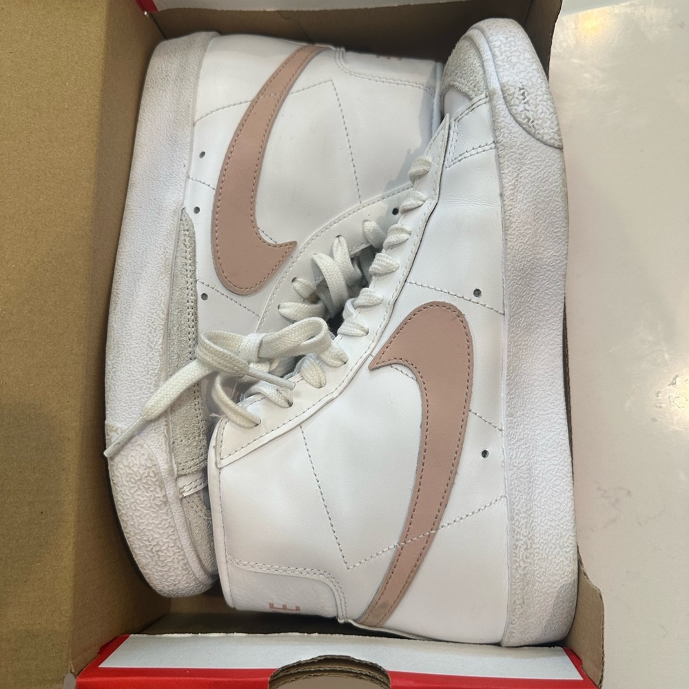 New in box Nike blazers size 7 in women’s and 5.5 in men’s.
